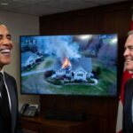 Barack Obama and Mark Carney inside of the Canada prime minister's office talking and laughing.