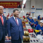 Donald Trump and Xi Jinping touring a factory with Chinese workers in China.