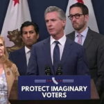 California Democrats and Gavin Newsom on stage giving a speech.