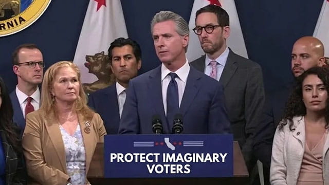 California Democrats and Gavin Newsom on stage giving a speech.