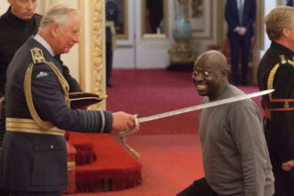 UK's King Charles knighting the Sudanese immigrant Belfast attacker.