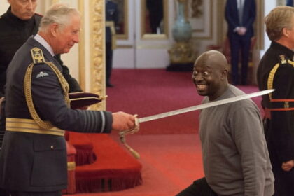 UK's King Charles knighting the Sudanese immigrant Belfast attacker.