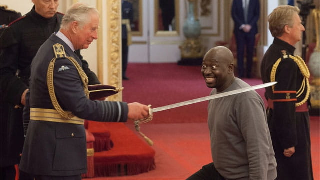UK's King Charles knighting the Sudanese immigrant Belfast attacker.