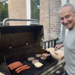 Democrat Chuck Schumer barbequing a raw hamburger on Father's Day.