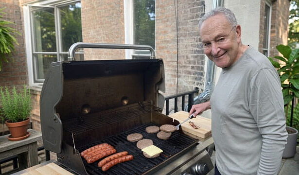 Democrat Chuck Schumer barbequing a raw hamburger on Father's Day.