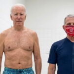 Dr. Fauci and Joe Biden wearing bathing suits inside of a shower.
