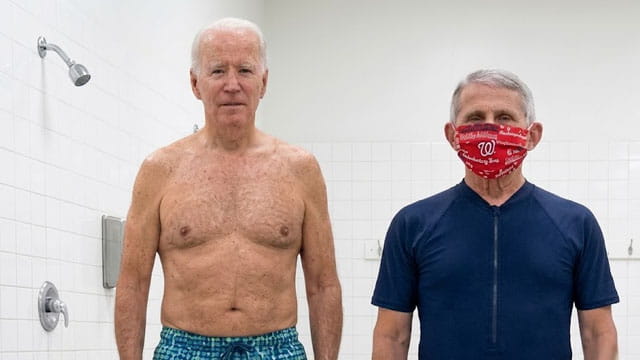 Dr. Fauci and Joe Biden wearing bathing suits inside of a shower.