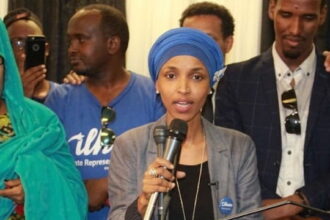 Ilhan Omar giving a speech in from of Minnesota Somalis about daycare fraud.