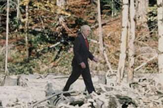 Mitch McConnell walking in the woods in a parody Bigfoot sighting.
