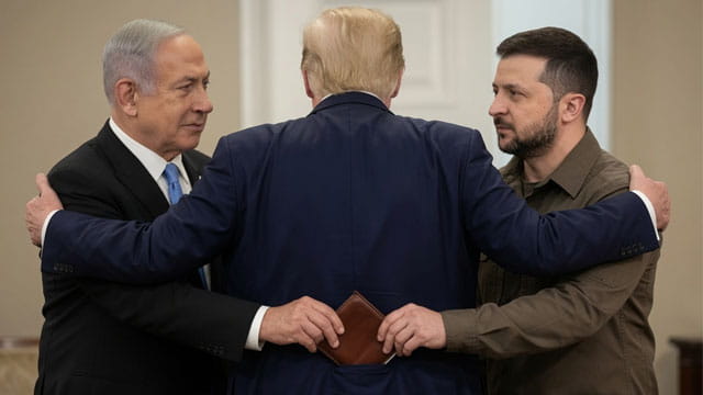 Benjamin Netanyahu and Volodymyr Zelensky hugging President Donald Trump inside of White House.