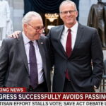 Congress members John Thune and Chuck Schumer hugging one another in Capitol Hill.