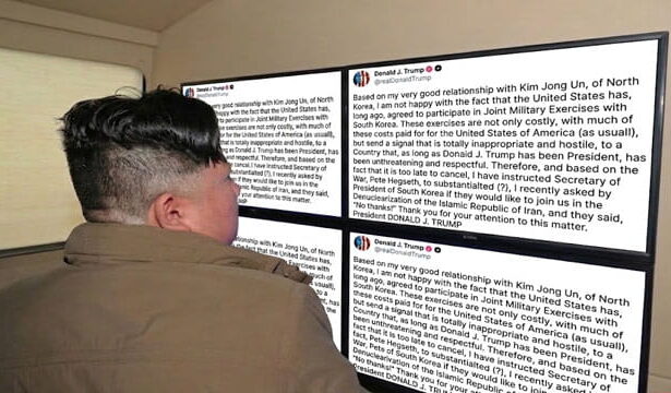 North Korea Leader Kim Jong Un looking at a computer screen with Trump's Truth Social post.