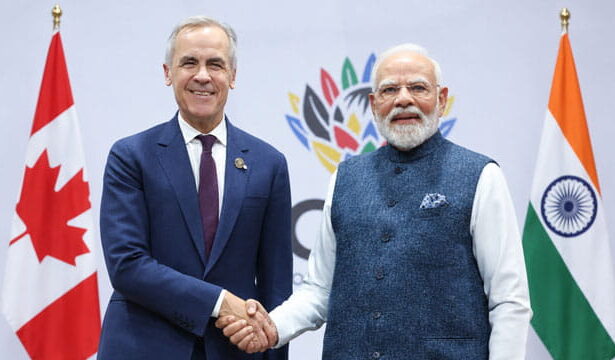 Canada Prime Minister Mark Carney shaking hands with India Prime Minister Modi.