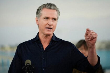 Gavin Newsom giving a press conference on El Niño .