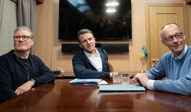 Keir Starmer, Emmanuel Macron, and Fred Merz on a train with a little bag filled with a white powder resembling cocaine.