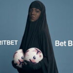 Sydney Sweeney wearing a black burka posing for a UK sports betting app ad.