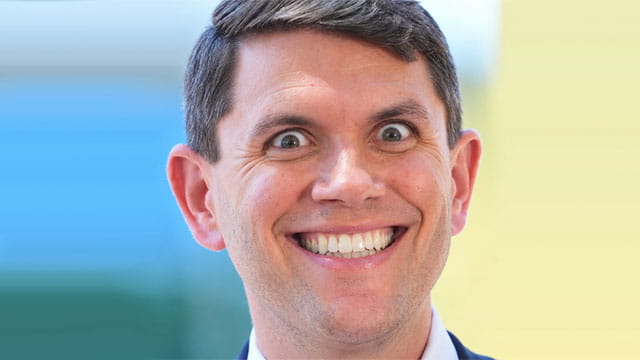 Male Democrat Texas politician James Talarico wearing a suit and smiling.