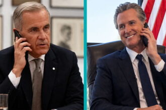 Canada male prime minister Mark Carney on the phone talking to California Governor Gavin Newsom on the phone.