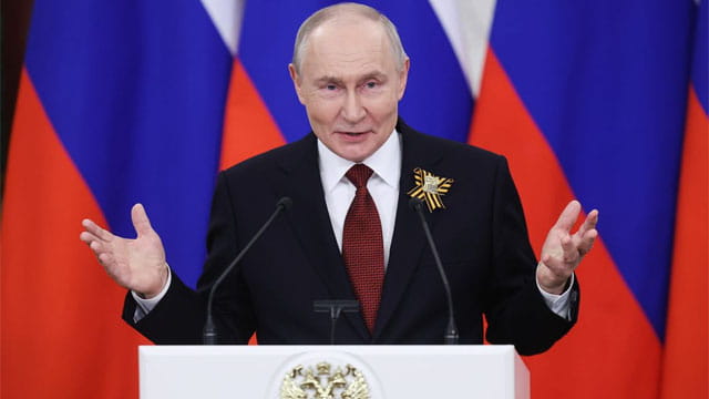 Russia President Vladimir Putin wearing suit behind a podium speaking on plague bacteria outbreak.